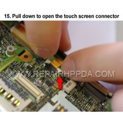 15. Pull down to open the touch screen connector